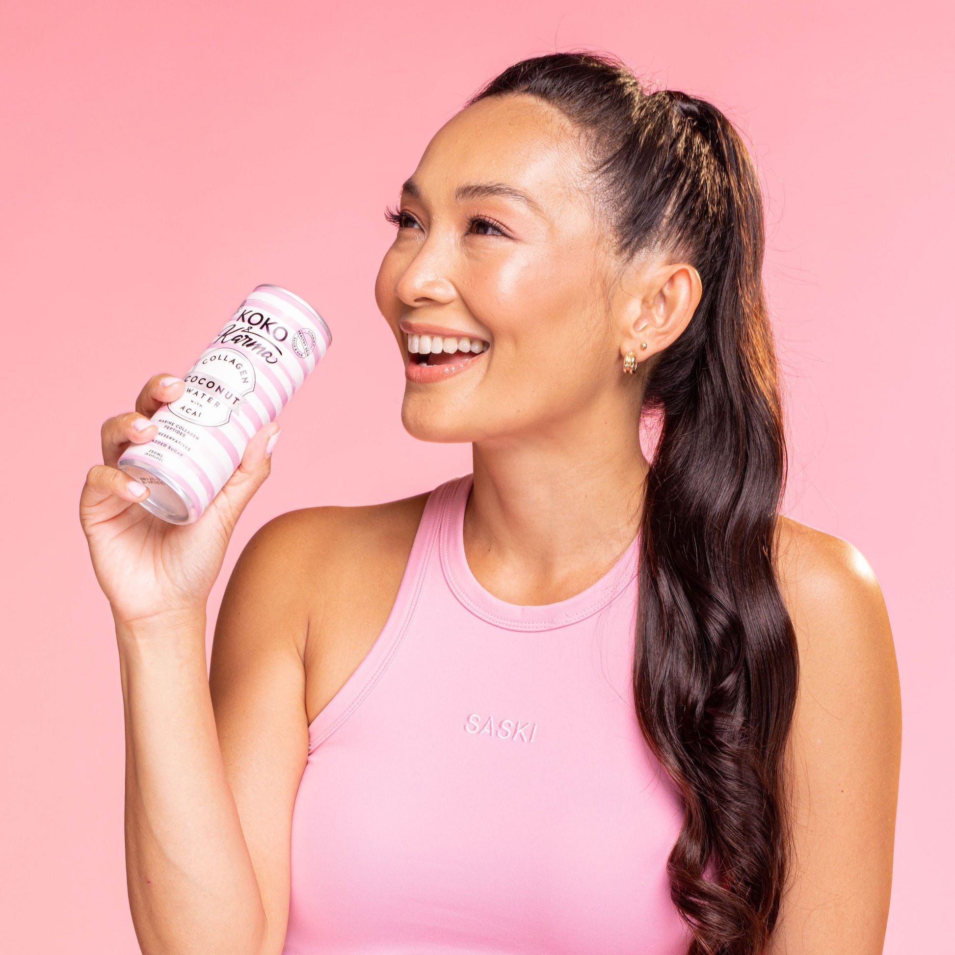 Lady holding coconut water